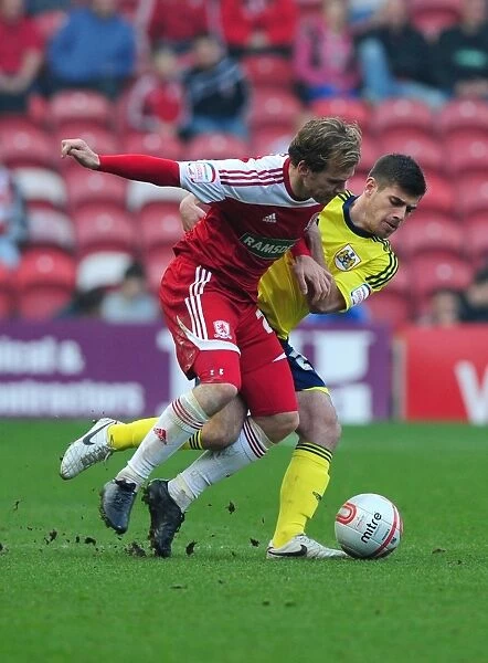 Battling for Supremacy: Edwards vs. Martin at Riverside Stadium - Middlesbrough vs. Bristol City Football Match, 2012