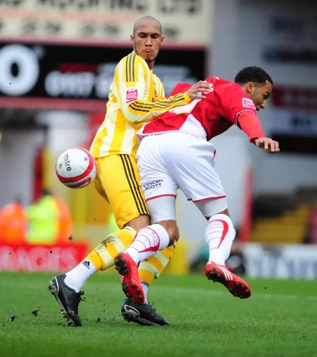 Framed Print : Battling for Supremacy: Fitz Hall vs. Nicky Maynard in the 2010 Championship Clash between Bristol City and Newcastle United