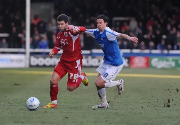 Framed Print : Battling for Supremacy: Foster vs. Boyd in Peterborough United vs. Bristol City Football Match, 2012