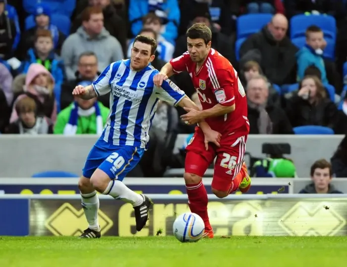 Framed Print : Battling for Supremacy: Foster vs. Vincelot in Championship Clash between Brighton and Bristol City - 14 / 01 / 2012