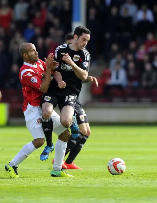 Framed Print : Battling for Supremacy: Greg Cunningham vs. Adam Chambers in Walsall vs. Bristol City Football Match, April 2014