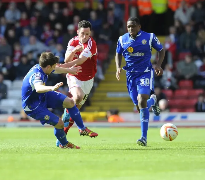 Framed Print : Battling for Supremacy: Greg Cunningham vs. Matt Tootle in Bristol City's Clash with Crewe (April 2014)