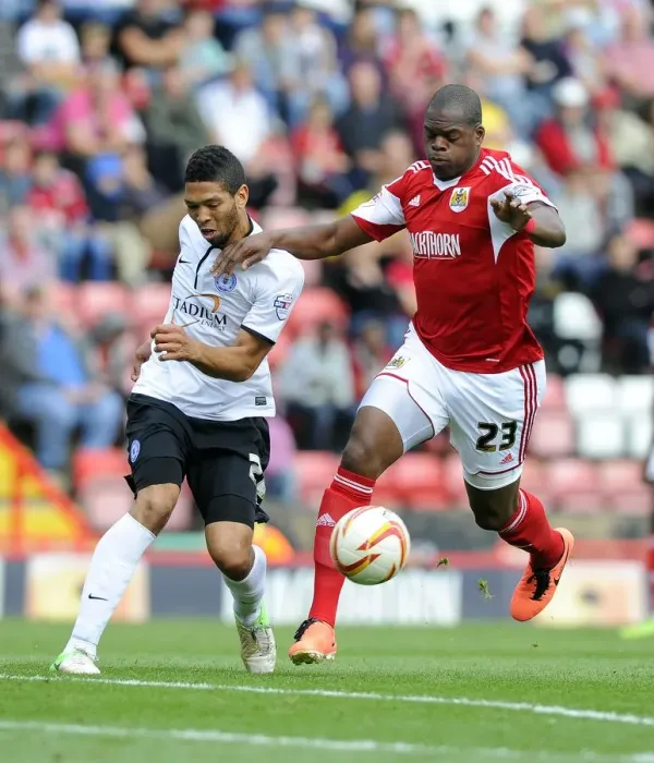 Framed Print : Battling for Supremacy: Harewood vs. Knight-Percival in Bristol City vs. Peterborough United Framed Print : Battling for Supremacy: Harewood vs. Knight-Percival in Bristol City vs. Peterborough United