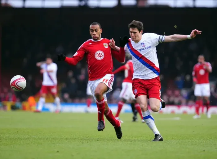 Framed Print : Battling for Supremacy: Haynes vs. McCarthy in the Championship Clash between Bristol City and Crystal Palace (December 2010)
