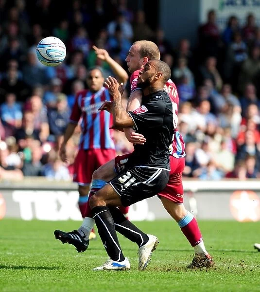 Battling for Supremacy: Haynes vs. Mirfin in the Championship Clash between Scunthorpe and Bristol City (17 / 04 / 2010)