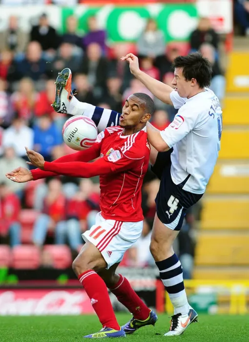 Framed Print : Battling for Supremacy: Haynes vs. St. Ledger in the Championship Clash between Bristol City and Preston North End