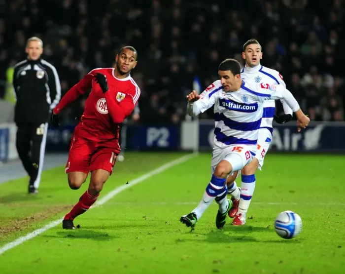 Framed Print : Battling for Supremacy: Haynes vs. Walker in QPR vs. Bristol City Championship Clash, January 2011