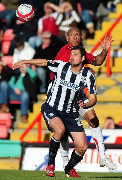 Battling for Supremacy: Iwelumo vs. Tamas in the Championship Clash between Bristol City and West Bromwich Albion (February 2010)