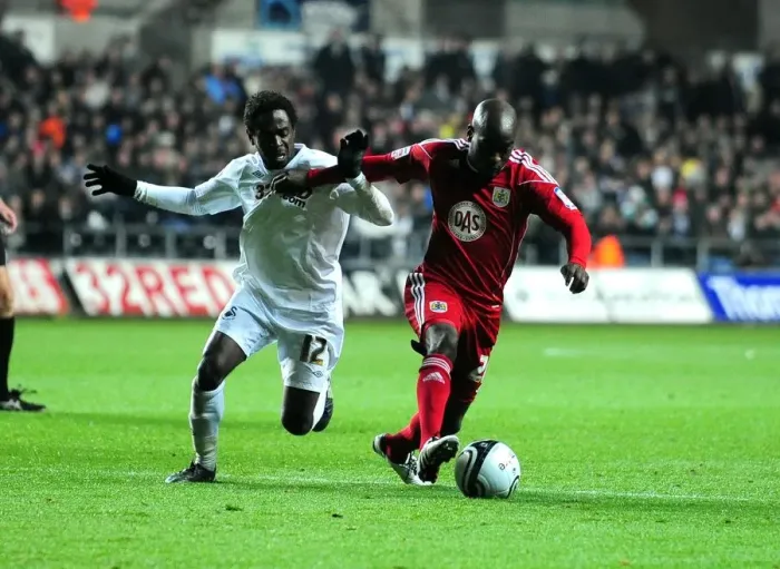Framed Print : Battling for Supremacy: Jamal Campbell-Ryce vs. Nathan Dyer in Swansea City vs. Bristol City Championship Clash (10 / 11 / 2010) Framed Print : Battling for Supremacy: Jamal Campbell-Ryce vs. Nathan Dyer in Swansea City vs. Bristol City Championship Clash (10 / 11 / 2010)