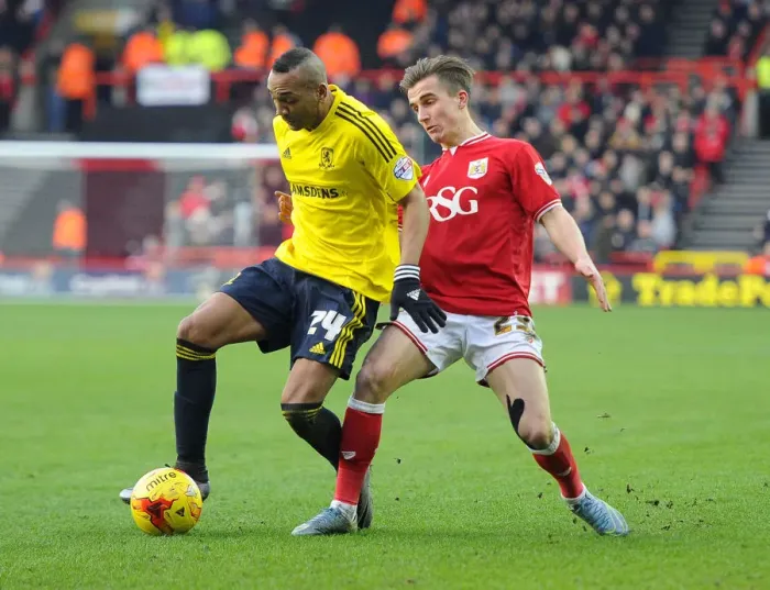 Framed Print : Battling for Supremacy: Joe Bryan vs. Emilio Nsue in the Bristol City vs. Middlesbrough Championship Clash