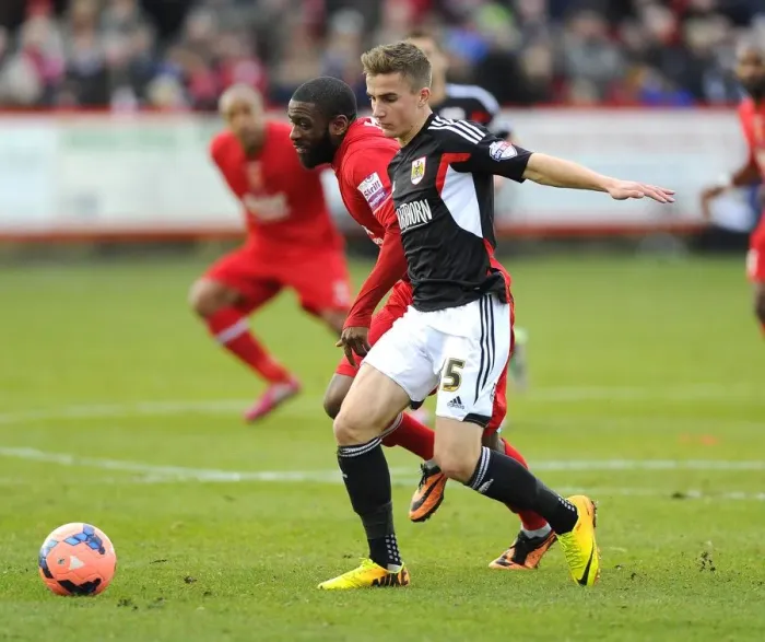 Framed Print : Battling for Supremacy: Joe Bryan vs. Justin Richards in FA Cup Clash