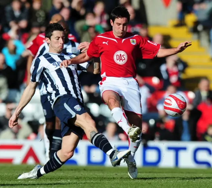 Framed Print : Battling for Supremacy: Johnson vs. Koren in the 2010 Bristol City vs. West Bromwich Albion Football Championship Clash