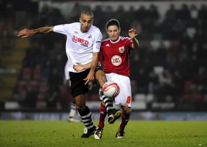Framed Print : Battling for Supremacy: Johnson vs. Pratley in the 2011 Championship Clash between Bristol City and Swansea City Framed Print : Battling for Supremacy: Johnson vs. Pratley in the 2011 Championship Clash between Bristol City and Swansea City