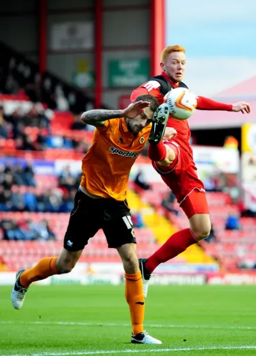 Framed Print : Battling for Supremacy: Johnson vs. Taylor in the Heights of Ashton Gate Framed Print : Battling for Supremacy: Johnson vs. Taylor in the Heights of Ashton Gate