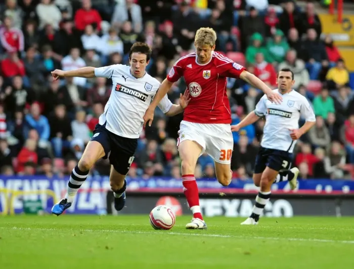 Framed Print : Battling for Supremacy: Jon Stead vs. Sean St. Ledger in the Championship Clash between Bristol City and Preston North End Framed Print : Battling for Supremacy: Jon Stead vs. Sean St. Ledger in the Championship Clash between Bristol City and Preston North End