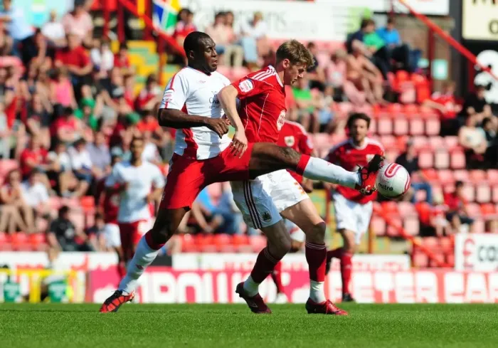 Framed Print : Battling for Supremacy: Jon Stead vs. Wes Morgan in the 2011 Championship Clash between Bristol City and Nottingham Forest