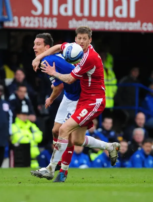 Framed Print : Battling for Supremacy: Jon Stead vs. Jason Pearce in Portsmouth vs. Bristol City Football Match, 2012