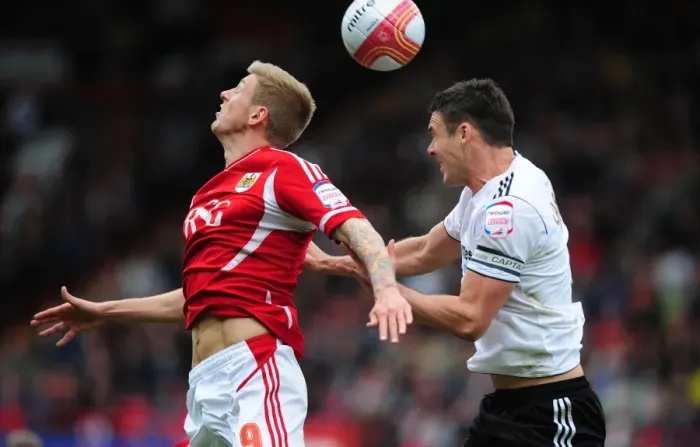 Framed Print : Battling for Supremacy: Jon Stead vs. Jason Shackell in the Derby County Clash at Ashton Gate, 2012