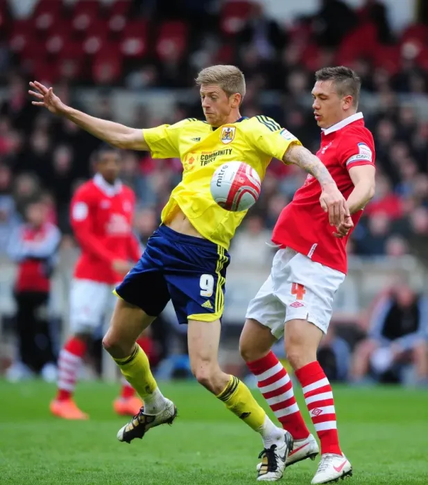 Framed Print : Battling for Supremacy: Jon Stead vs. Luke Chambers in Nottingham Forest vs. Bristol City Football Match, April 2012 Framed Print : Battling for Supremacy: Jon Stead vs. Luke Chambers in Nottingham Forest vs. Bristol City Football Match, April 2012