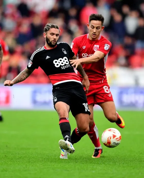 Framed Print : Battling for Supremacy: Josh Brownhill vs. Henri Lansbury in Bristol City vs. Nottingham Forest Championship Clash