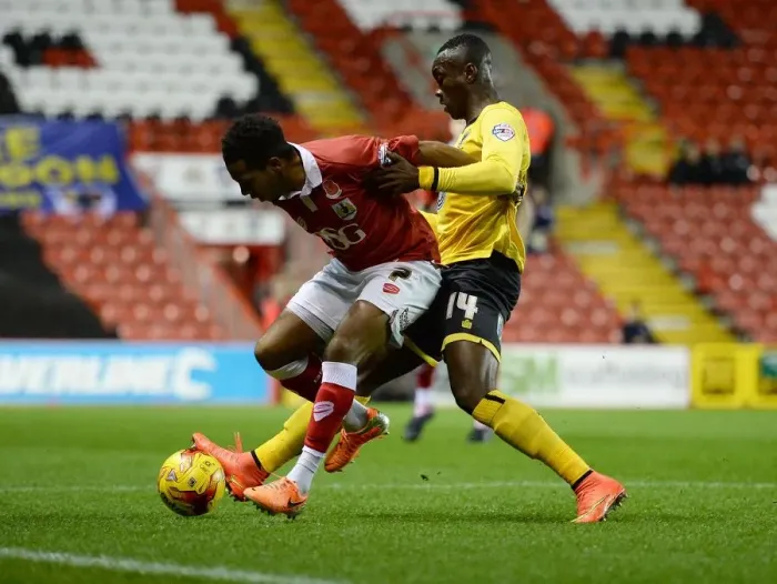Framed Print : Battling for Supremacy: Korey Smith vs. Adebayo Azeez in the Johnstone's Paint Trophy Clash between Bristol City and AFC Wimbledon Framed Print : Battling for Supremacy: Korey Smith vs. Adebayo Azeez in the Johnstone's Paint Trophy Clash between Bristol City and AFC Wimbledon