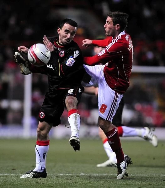 Battling for Supremacy: Lee Johnson vs. Leon Britton in the Championship Clash between Bristol City and Sheffield United (November 2010)