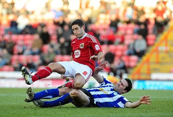 Battling for Supremacy: Lee Johnson vs. Tommy Miller in the FA Cup Clash between Bristol City and Sheffield Wednesday