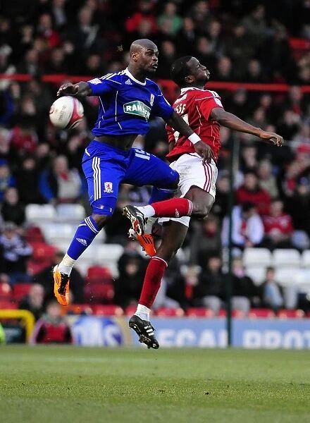 Battling for Supremacy: Leroy Lita vs. Kalifa Cisse in the Championship Clash between Bristol City and Middlesbrough