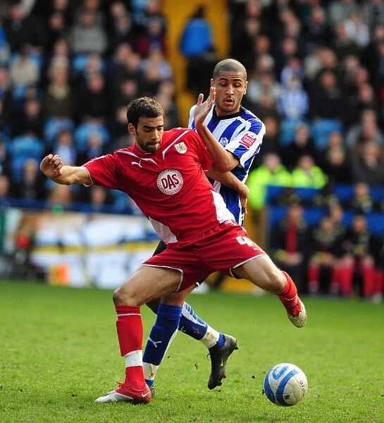 Battling for Supremacy: Liam Fontaine vs. Marcus Tudgay in the Championship Clash between Sheffield Wednesday and Bristol City (16th March 2010)