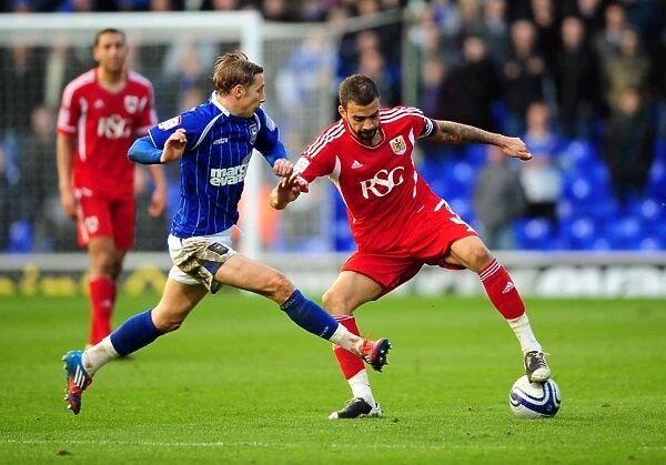Battling for Supremacy: Liam Fontaine vs. Lee Martin in Ipswich Town vs. Bristol City Football Match, March 2012