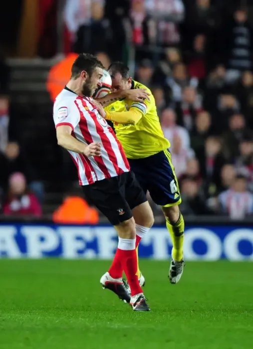 Framed Print : Battling for Supremacy: Louis Carey vs. Rickie Lambert in Southampton v Bristol City Championship Clash (December 2011) Framed Print : Battling for Supremacy: Louis Carey vs. Rickie Lambert in Southampton v Bristol City Championship Clash (December 2011)