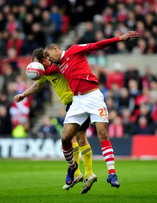 Framed Print : Battling for Supremacy: Louis Carey vs. Dexter Blackstock in Nottingham Forest vs. Bristol City Football Match, 07-04-2012 Framed Print : Battling for Supremacy: Louis Carey vs. Dexter Blackstock in Nottingham Forest vs. Bristol City Football Match, 07-04-2012