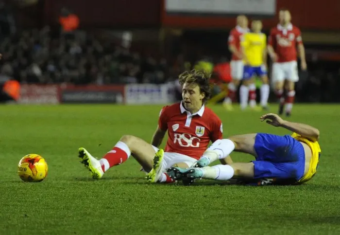 Framed Print : Battling for Supremacy: Luke Freeman Fights for the Ball in Bristol City's Victory over Crawley Town Framed Print : Battling for Supremacy: Luke Freeman Fights for the Ball in Bristol City's Victory over Crawley Town