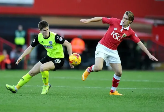 Framed Print : Battling for Supremacy: Luke Freeman vs. Daniel Philliskirk - A Football Showdown at Ashton Gate
