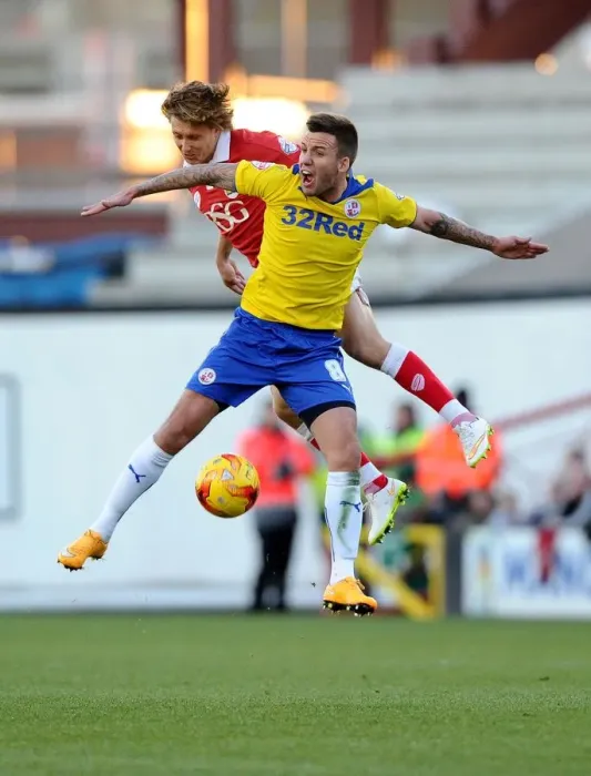 Framed Print : Battling for Supremacy: Luke Freeman vs. Jimmy Smith in Bristol City's Clash with Crawley Town