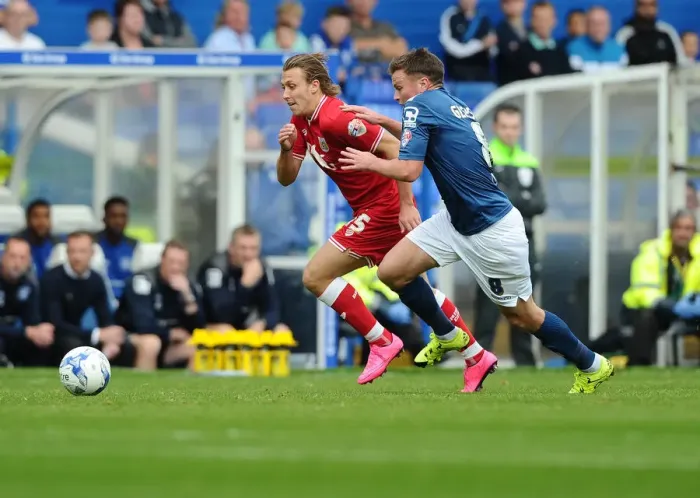 Framed Print : Battling for Supremacy: Luke Freeman vs. Stephen Gleeson in Birmingham City vs. Bristol City Championship Clash