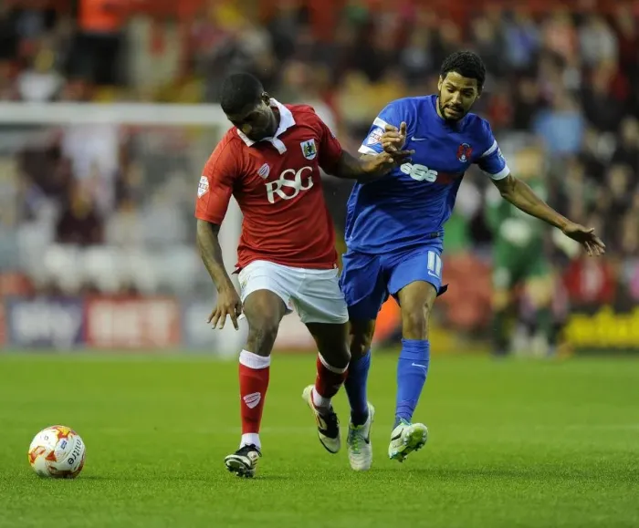 Framed Print : Battling for Supremacy: Mark Little vs. Jobi McAnuff in the 2014 Bristol City vs. Leyton Orient Clash