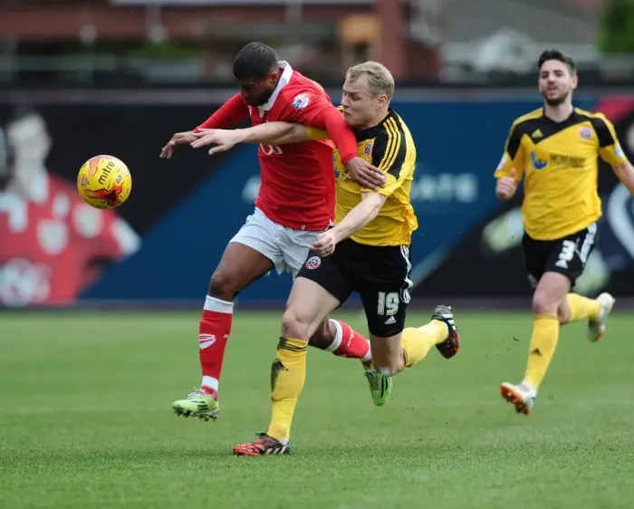 Framed Print : Battling for Supremacy: Mark Little vs. James McEveley in Bristol City vs. Sheffield United