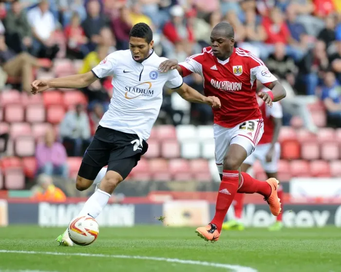 Framed Print : Battling for Supremacy: Marlon Harewood vs. Nat Knight-Percival in the Thrilling Bristol City vs. Peterborough United Clash Framed Print : Battling for Supremacy: Marlon Harewood vs. Nat Knight-Percival in the Thrilling Bristol City vs. Peterborough United Clash