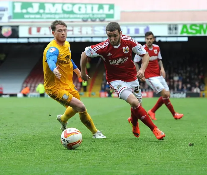 Framed Print : Battling for Supremacy: Martin Paterson vs. Joe Garner in the Intense Clash between Bristol City and Preston North End