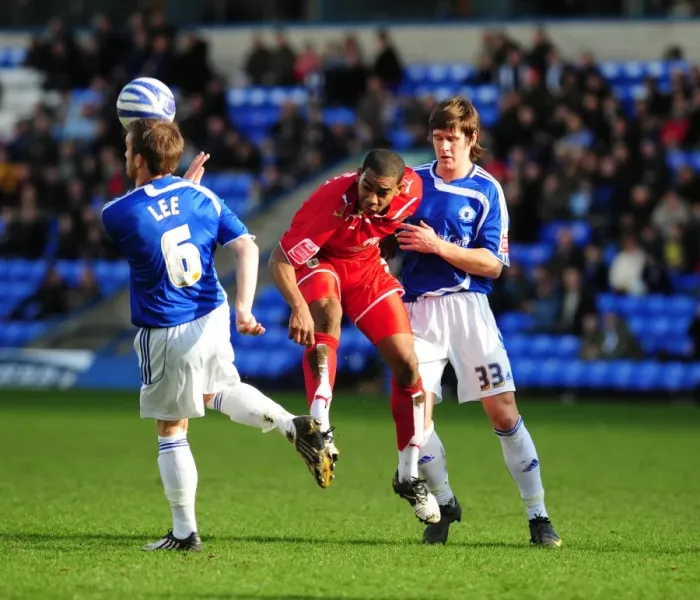 Framed Print : Battling for Supremacy: Marvin Elliott vs. Josh Simpson and Charlie Lee in Peterborough v Bristol City Championship Clash Framed Print : Battling for Supremacy: Marvin Elliott vs. Josh Simpson and Charlie Lee in Peterborough v Bristol City Championship Clash