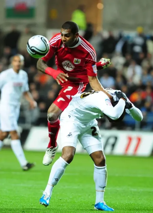 Framed Print : Battling for Supremacy: Marvin Elliott vs. Kemy Agustien in Swansea City vs. Bristol City Championship Clash (10 / 11 / 2010) Framed Print : Battling for Supremacy: Marvin Elliott vs. Kemy Agustien in Swansea City vs. Bristol City Championship Clash (10 / 11 / 2010)