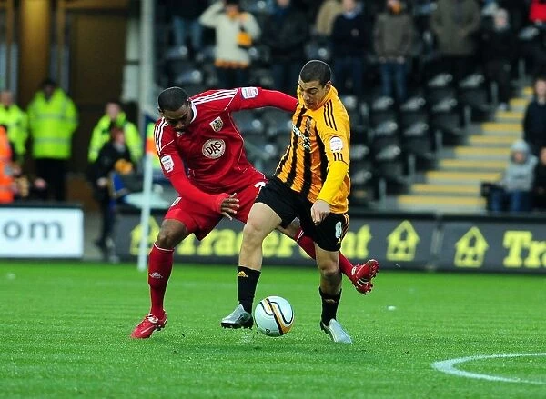 Battling for Supremacy: Marvin Elliott vs. James Harper in Hull City vs. Bristol City Championship Clash (18 / 12 / 2010)