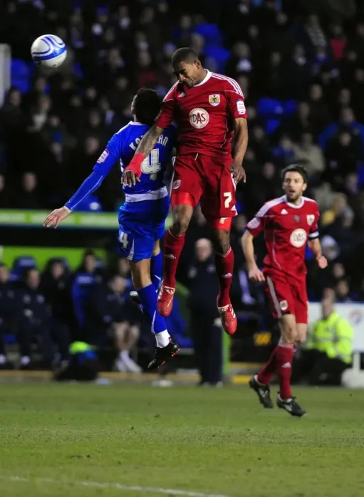 Framed Print : Battling for Supremacy: Marvin Elliott vs. Jem Karacan in the Championship Clash between Reading and Bristol City (December 26, 2010) Framed Print : Battling for Supremacy: Marvin Elliott vs. Jem Karacan in the Championship Clash between Reading and Bristol City (December 26, 2010)