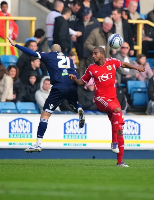 Framed Print : Battling for Supremacy: Marvin Elliott vs. Jack Smith in Millwall vs. Bristol City Championship Clash, 2011 Framed Print : Battling for Supremacy: Marvin Elliott vs. Jack Smith in Millwall vs. Bristol City Championship Clash, 2011