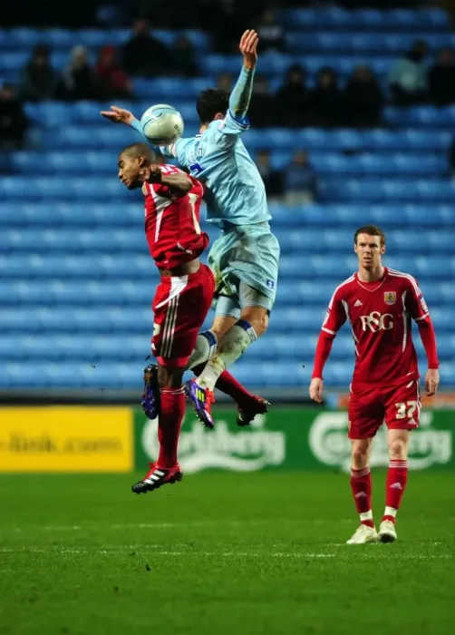 Framed Print : Battling for Supremacy: Marvin Elliott vs. Richard Keogh in Coventry City vs. Bristol City Championship Clash (December 26, 2011) Framed Print : Battling for Supremacy: Marvin Elliott vs. Richard Keogh in Coventry City vs. Bristol City Championship Clash (December 26, 2011)