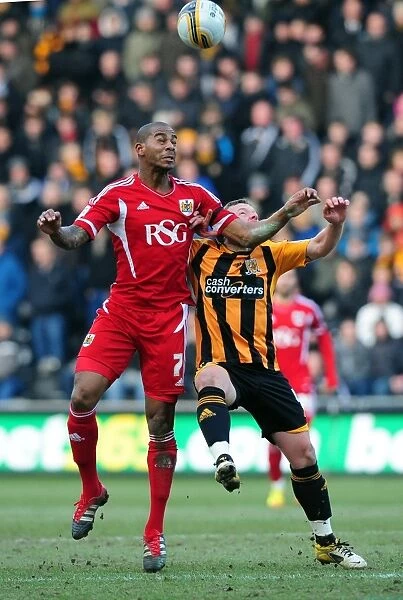 Battling for Supremacy: Marvin Elliott vs. Paul McKenna in Hull City vs. Bristol City Championship Clash - 11 / 02 / 2012