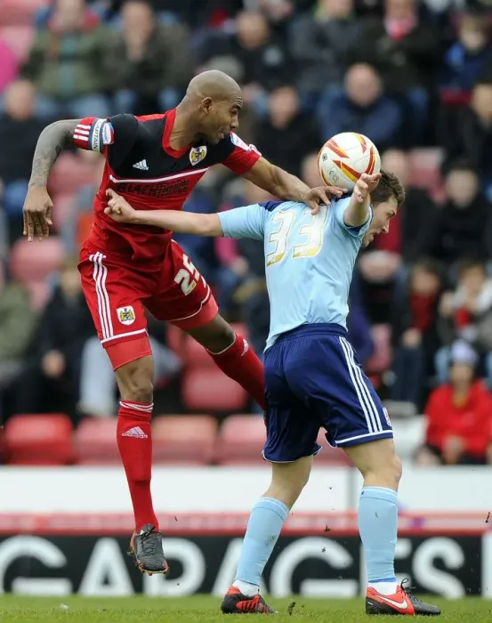 Framed Print : Battling for Supremacy: Marvin Elliott vs. Richard Smallwood in the Npower Championship Clash between Bristol City and Middlesbrough Framed Print : Battling for Supremacy: Marvin Elliott vs. Richard Smallwood in the Npower Championship Clash between Bristol City and Middlesbrough