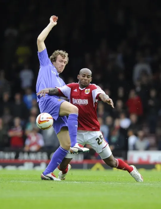 Framed Print : Battling for Supremacy: Marvin Elliott vs. Kevin McDonald in Bristol City vs. Wolves Football Match Framed Print : Battling for Supremacy: Marvin Elliott vs. Kevin McDonald in Bristol City vs. Wolves Football Match