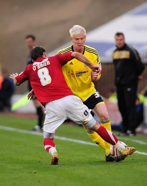 Battling for Supremacy: McGivern vs. O'Brien in Championship Clash between Barnsley and Bristol City